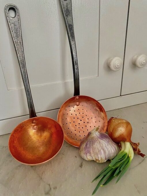 copper ladle and slotted spoon